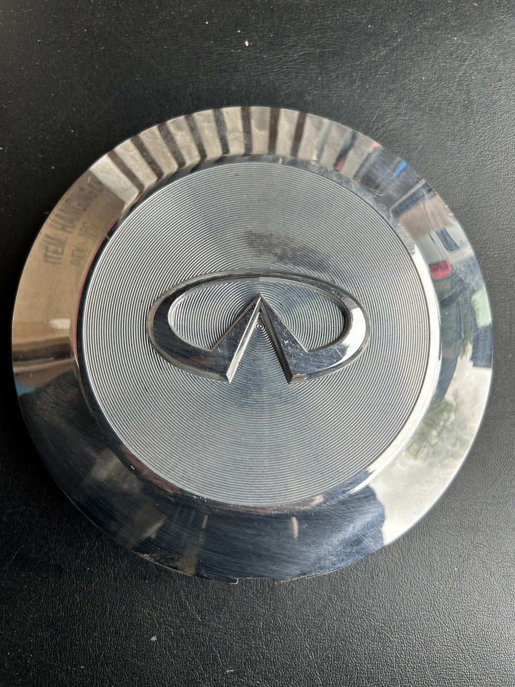 Infiniti QX56 center cap, chrome, 2004-2007 part number 40315 7S510 03