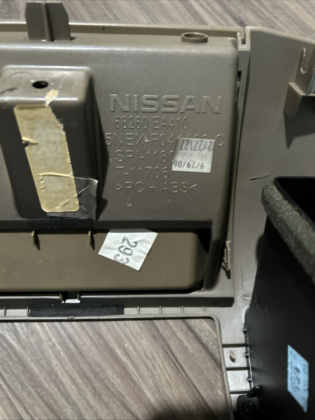 2005-2007 NISSAN PATHFINDER RADIO BEZEL DIGITAL TAN SILVER SURROUND TRIM DASH