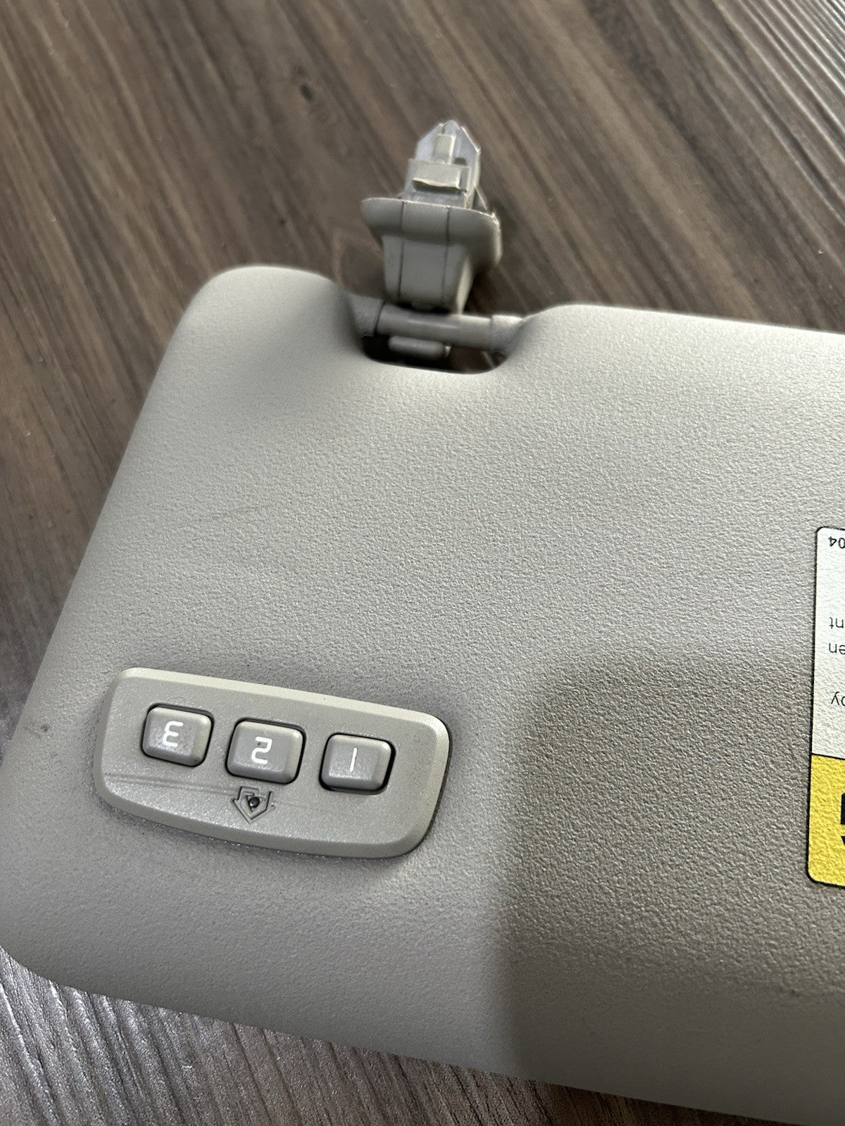 2009 Volvo C70 Left Driver Sunvisor with Homelink garage door opener Gray