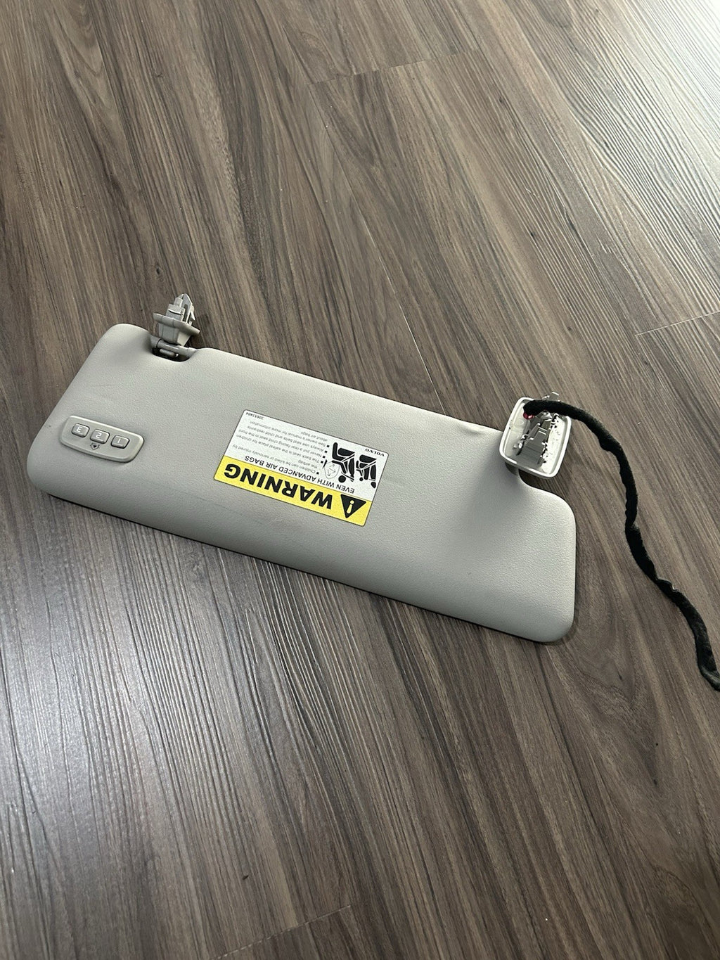 2009 Volvo C70 Left Driver Sunvisor with Homelink garage door opener Gray