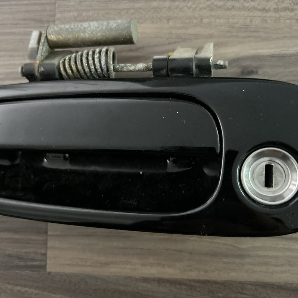 2000-2005 TOYOTA CELICA LEFT DRIVER SIDE OUTSIDE  DOOR HANDLE  OEM BLACK